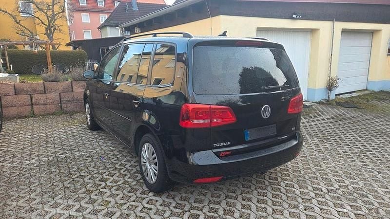 Gebraucht VW Touran Comfortline 105 PS (77 kW) 2011 Schwarz Van / Kleinbus