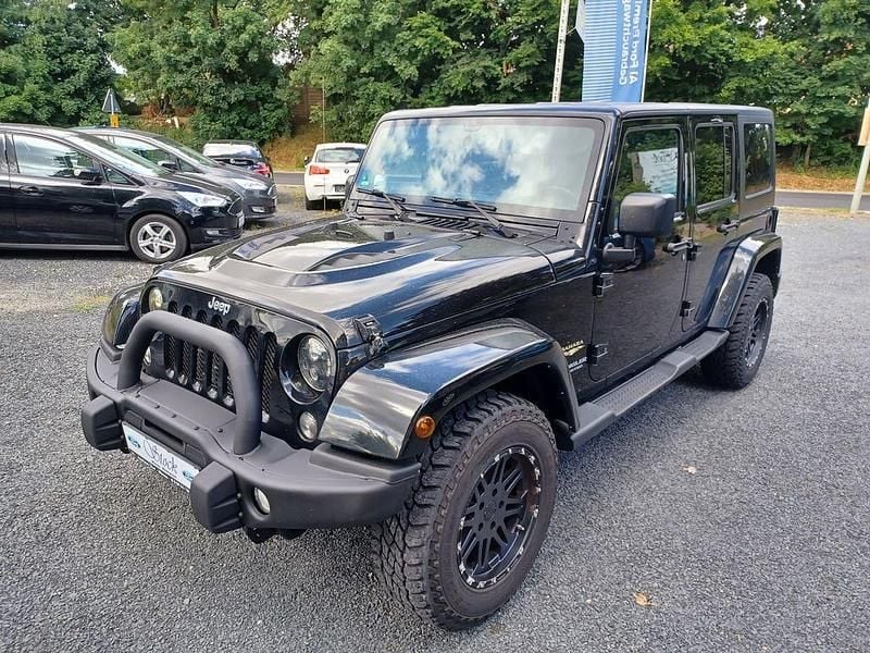 Schwarz Gebraucht 2015 Jeep Wrangler Sahara SUV | 23.990 € (Superpreis) - Bild 1/4
