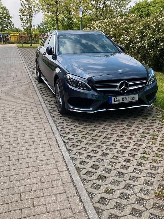 Schwarz Gebraucht 2014 Mercedes C180 AMG line Limousine | 14.400 € (Fairer Preis) - Bild 1/4