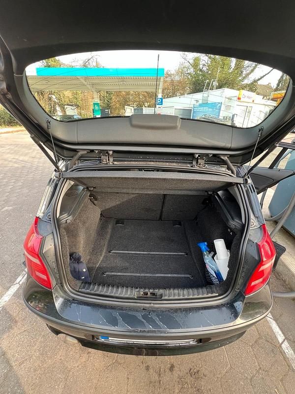 Second-hand BMW 116 122 CP (89 kW) 2007 Negru Hatchback