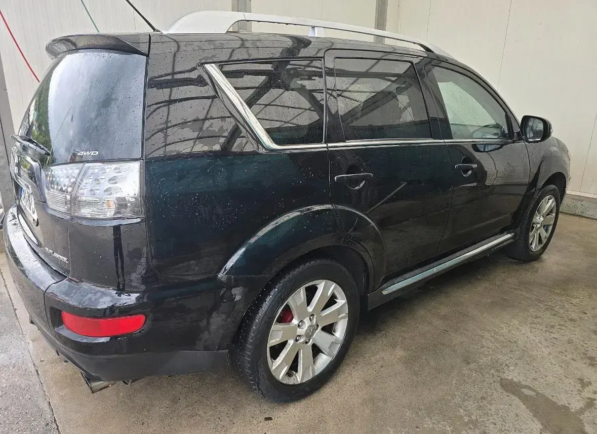 Gebraucht Mitsubishi Outlander 156 PS (114 kW) 2009 Schwarz SUV