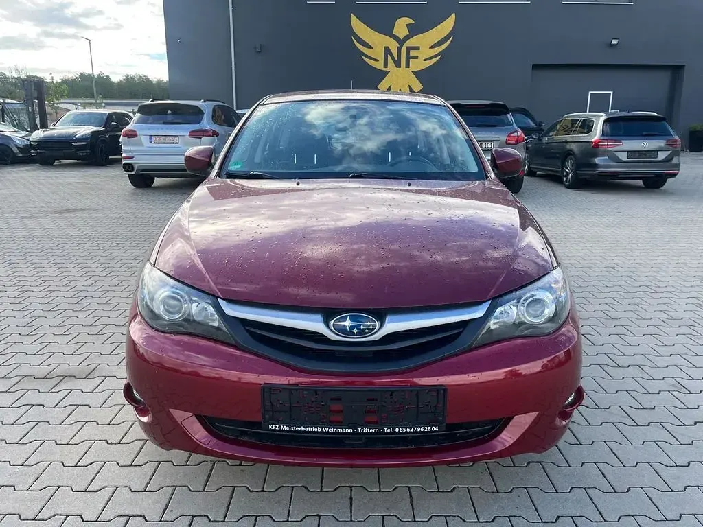 Gebraucht Subaru Impreza Active 107 PS (78 kW) 2011 Rot Limousine