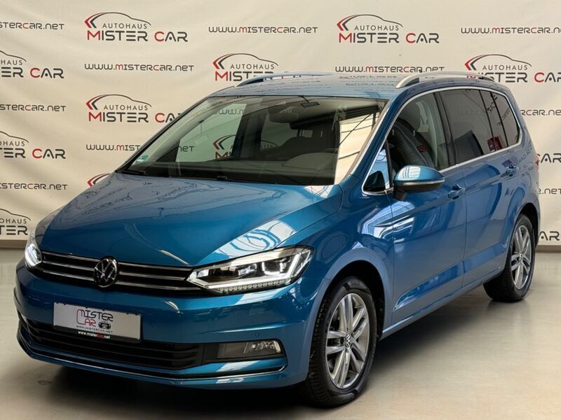 Caribbean blue metallic Gebraucht 2023 VW Touran Highline Van / Kleinbus | 26.790 € - Bild 1/4