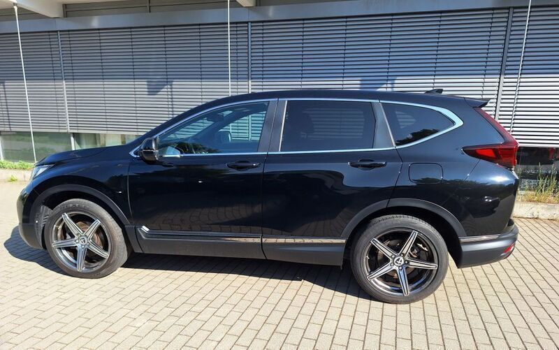 Dunkel schwarz metallic Gebraucht 2022 Honda CR-V Hybrid SUV | 27.980 € (Etwas zu teuer) - Bild 1/4