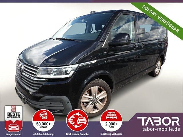 Schwarz metallic Gebraucht 2023 VW Multivan Comfortline Van | 52.888 € (Teuer) - Bild 1/4
