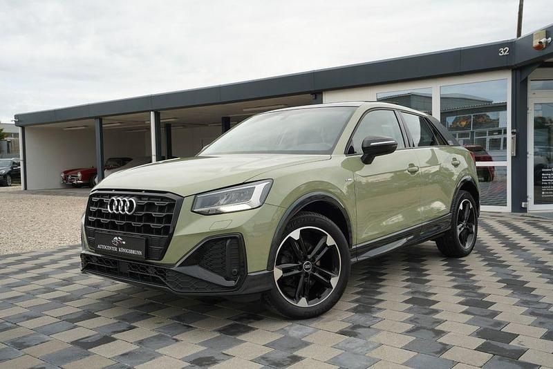 Grün Gebraucht 2021 Audi Q2 S-Line SUV | 26.950 € (Etwas zu teuer) - Bild 1/4
