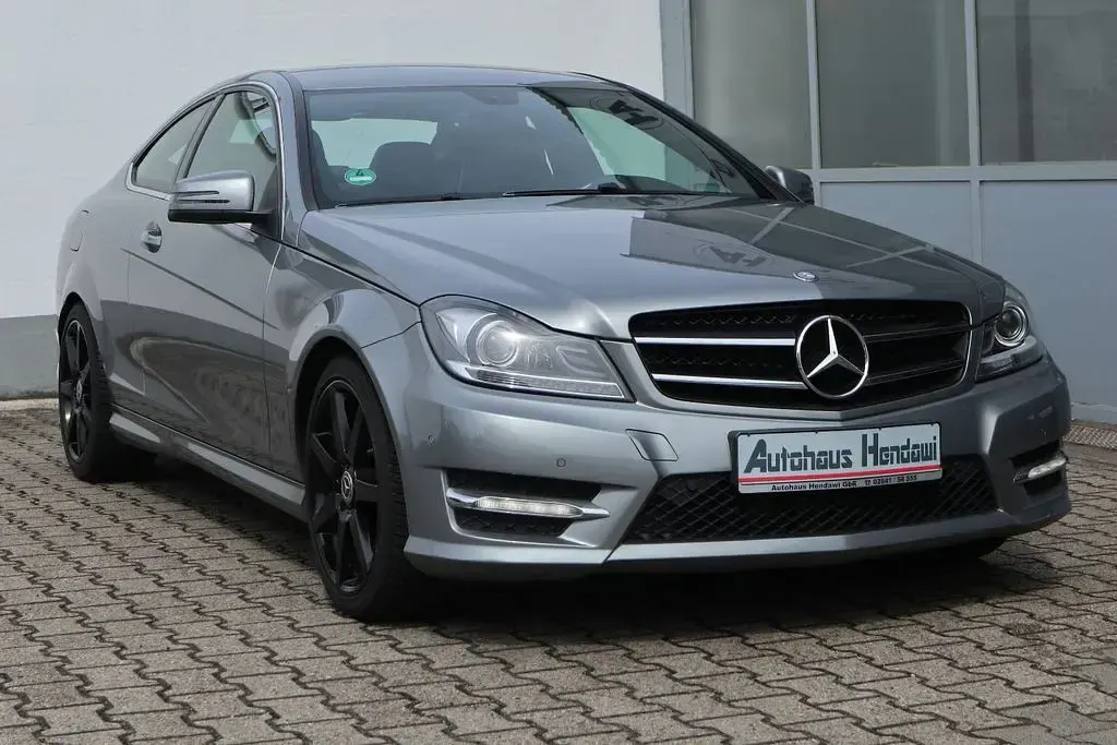 Gebraucht Mercedes C180 AMG 156 PS (114 kW) 2012 Silber Coupé