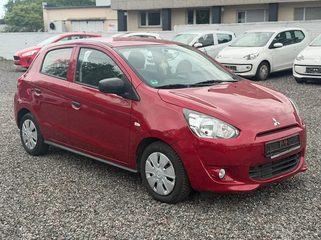 Gebraucht Mitsubishi Space Star Basis 71 PS (52 kW) 2014 Rot Van / Kleinbus