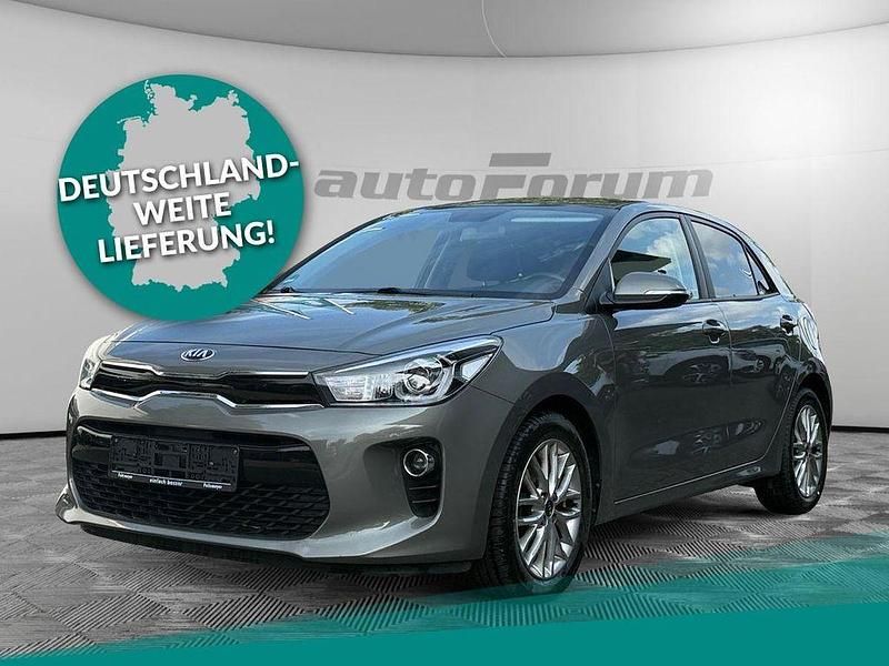 Grün Gebraucht 2017 Kia Rio DREAM-TEAM Edition Limousine | 9.971 € (Fairer Preis) - Bild 1/4
