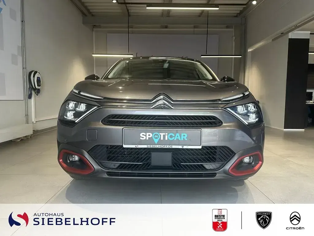 Gebraucht Citroën e-C4 Shine 100 kW (136 PS) 2022 Platinium grau Limousine