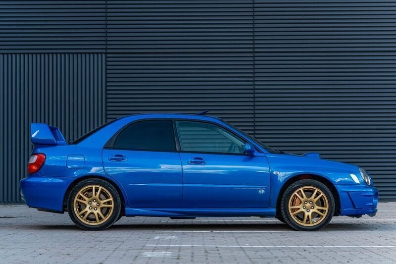 Gebraucht Subaru Impreza 280 PS (205 kW) 2001 Blau Limousine