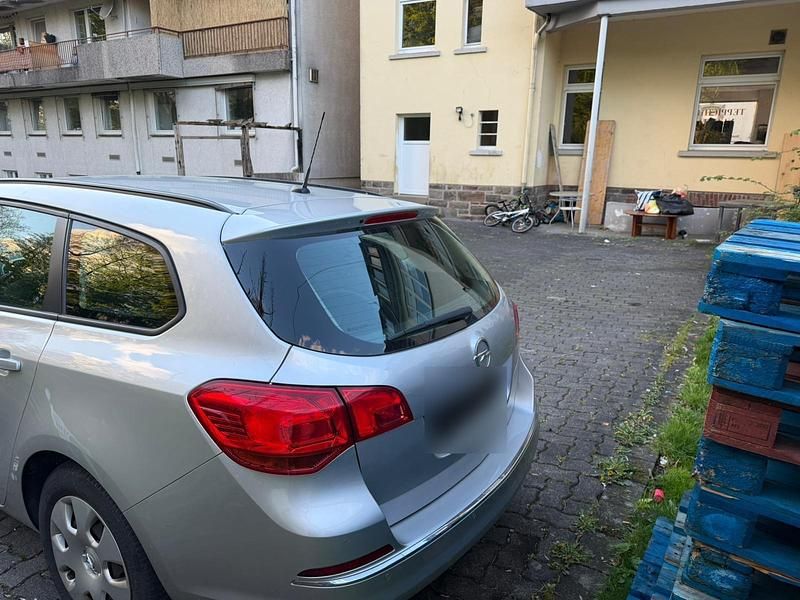 Second-hand Opel Astra Active 140 CP (102 kW) 2013 Argintiu Break