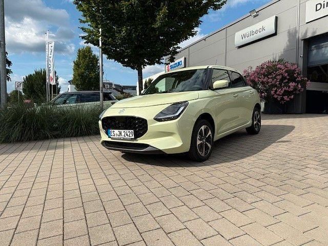 Gelb Neu 2025 Suzuki Swift Comfort+ Kleinwagen | 21.490 € - Bild 1/4