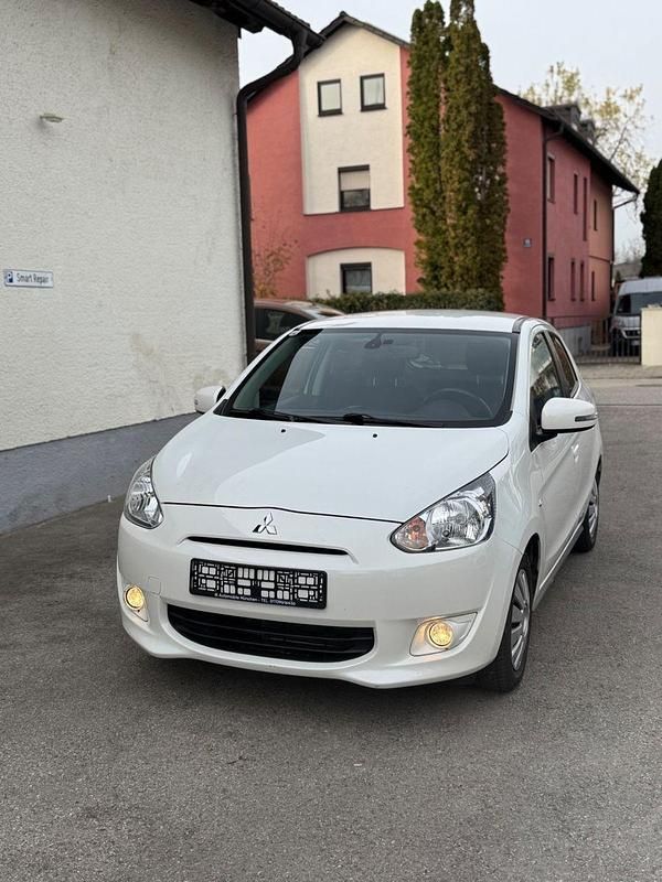 Weiß Gebraucht 2015 Mitsubishi Space Star Intense Kleinwagen | 8.790 € (Teuer) - Bild 1/4