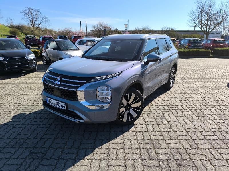 Mondsteingrau Neu 2025 Mitsubishi Outlander P-HEV Top SUV | 59.990 € (Fairer Preis) - Bild 1/4