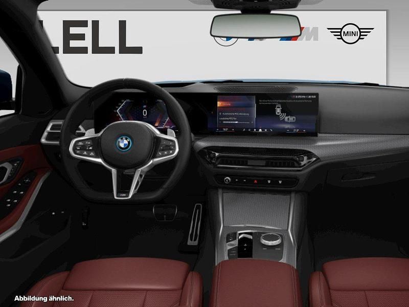 Gebraucht BMW 330e M Sport 184 PS (135 kW) 2024 Blau Kombi