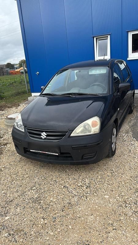 Schwarz Gebraucht 2004 Suzuki Liana Kleinwagen | 549 € - Bild 1/4