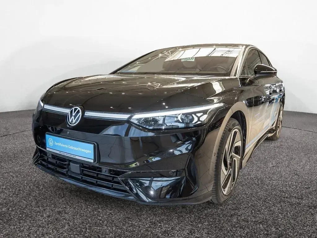 Gebraucht VW ID.7 Pro 210 kW (286 PS) 2023 Grenadillschwarz metallic Kleinwagen