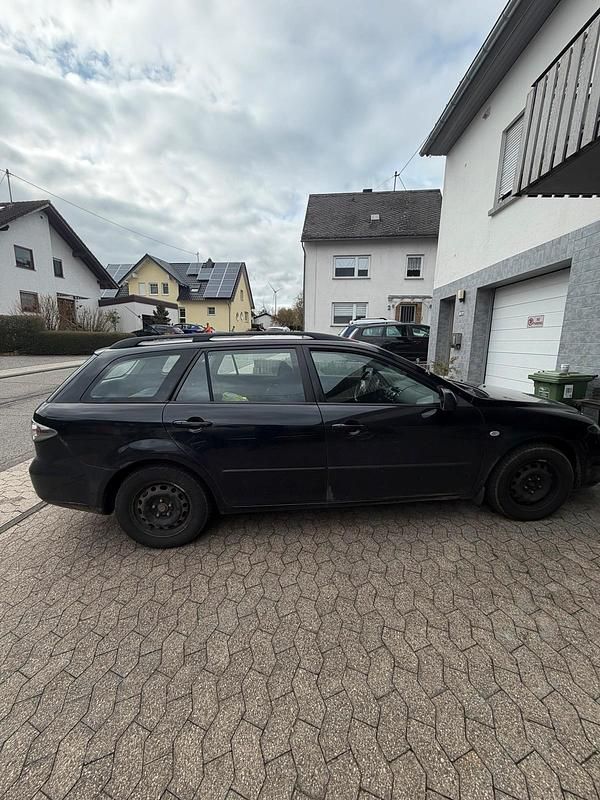 Używany Mazda 6 150 KM (110 kW) 2006 Czarny Kombi