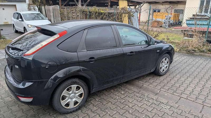 Używany Ford Focus Titanium 101 KM (74 kW) 2011 Czarny Sedan/Limuzyna