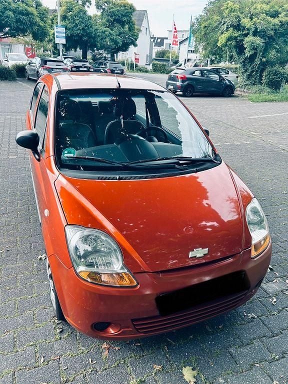 Orange Gebraucht 2010 Chevrolet Matiz Kleinwagen | 750 € (Superpreis) - Bild 1/4