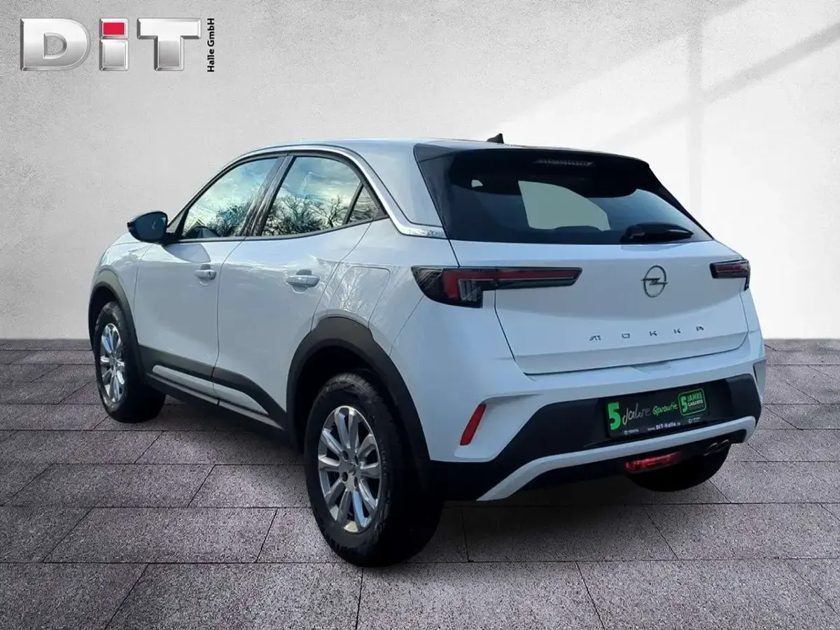 Gebraucht Opel Mokka Enjoy 131 PS (96 kW) 2023 Lack weiss banquise/typ aussenverkleidun (metallic) SUV
