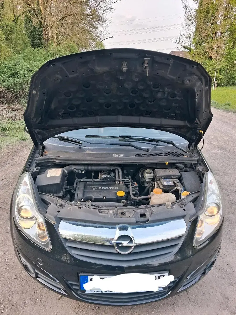 Gebraucht Opel Corsa 80 PS (58 kW) 2010 Schwarz Kleinwagen