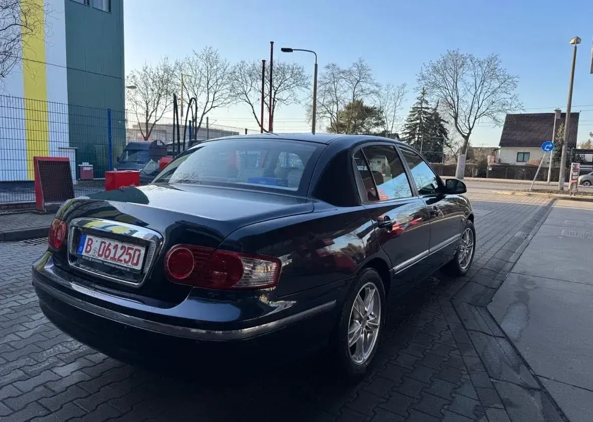 Gebraucht Kia Opirus 203 PS (149 kW) 2006 Blau Limousine