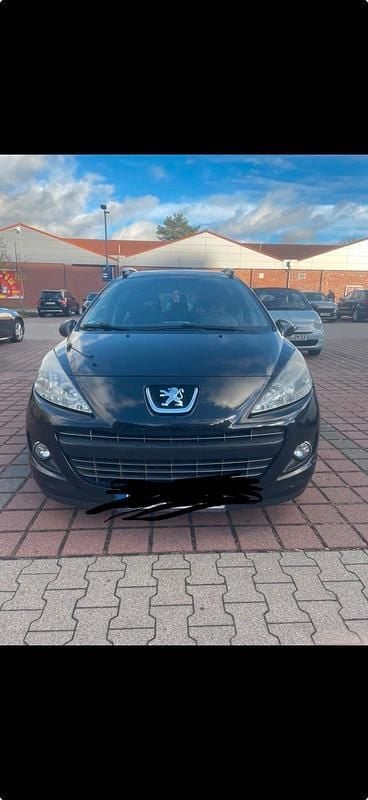 Gebraucht Peugeot 207 95 PS (69 kW) 2011 Schwarz Kombi