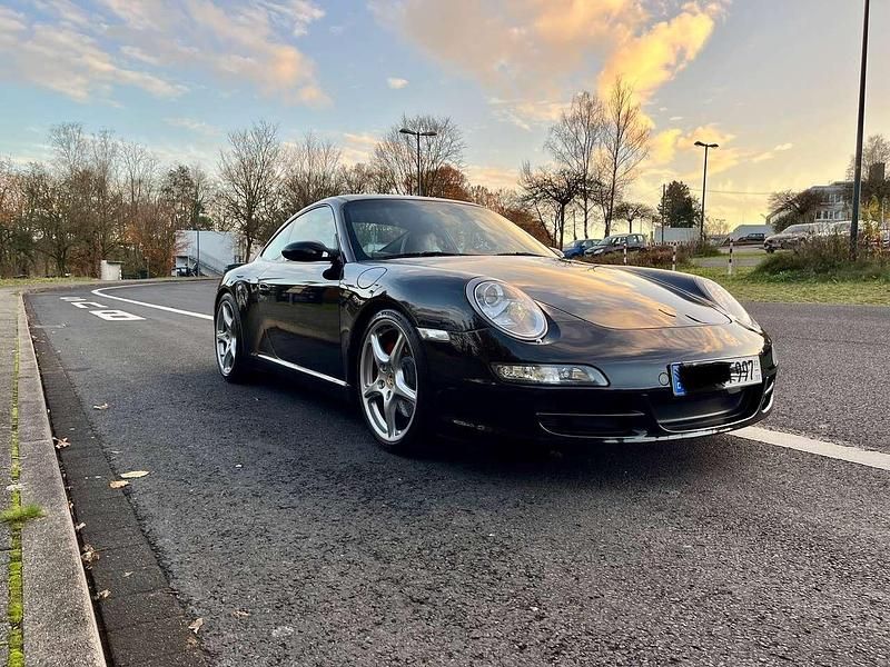 Schwarz Gebraucht 2006 Porsche 911 Carrera S Coupé | 44.997 € (Superpreis) - Bild 1/4