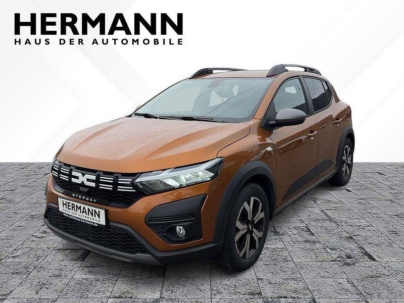 Gebraucht Dacia Sandero Expression 101 PS (74 kW) 2023 Taklamakanorange (orange) Kleinwagen