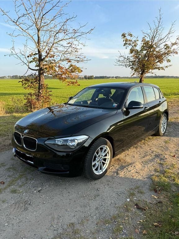 Schwarz Gebraucht 2011 BMW 116 Kleinwagen | 7.899 € (Fairer Preis) - Bild 1/4