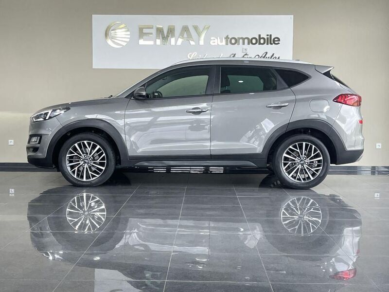 Grau Gebraucht 2018 Hyundai Tucson Premium SUV | 18.989 € (Fairer Preis) - Bild 1/4