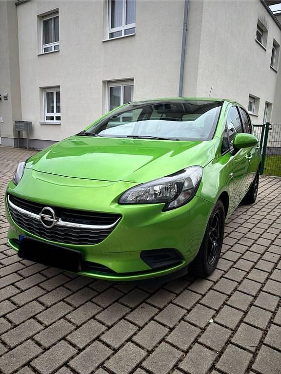Gebraucht Opel Corsa Active 90 PS (66 kW) 2015 Grün Kleinwagen