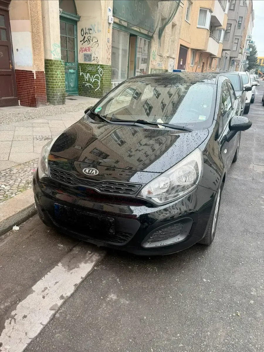 Gebraucht Kia Rio 85 PS (62 kW) 2011 Schwarz Kleinwagen