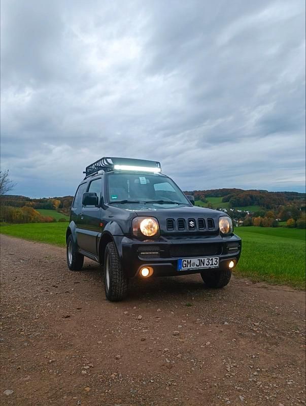 Schwarz Gebraucht 2006 Suzuki Jimny SUV | 9.500 € - Bild 1/4