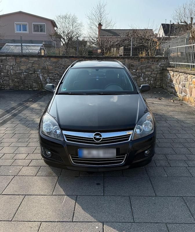 Second-hand Opel Astra 110 CP (80 kW) 2009 Negru Break