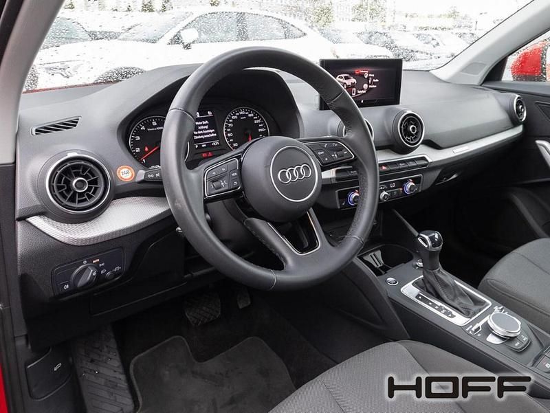 Gebraucht Audi Q2 Advanced Plus 150 PS (110 kW) 2023 Tangorot metallic SUV