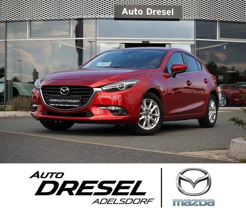 Rubinrot metallic Gebraucht 2018 Mazda 3 Exclusive-Line Limousine | 12.990 € (Fairer Preis) - Bild 1/4