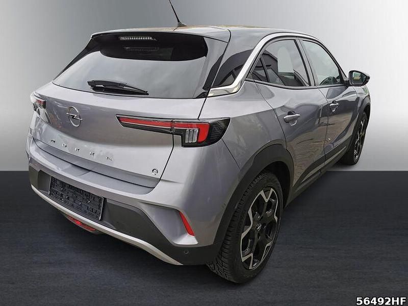 Gebraucht Opel Mokka-e Ultimate 100 kW (136 PS) 2022 Kontrast grau/quarz silber SUV