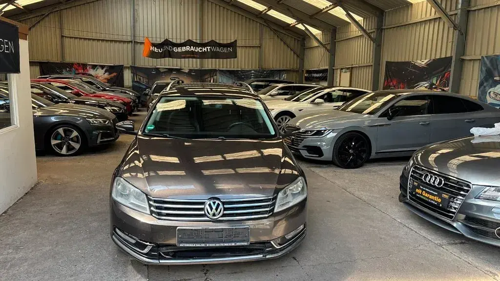 Second-hand VW Passat Highline 177 CP (130 kW) 2013 Negru Break