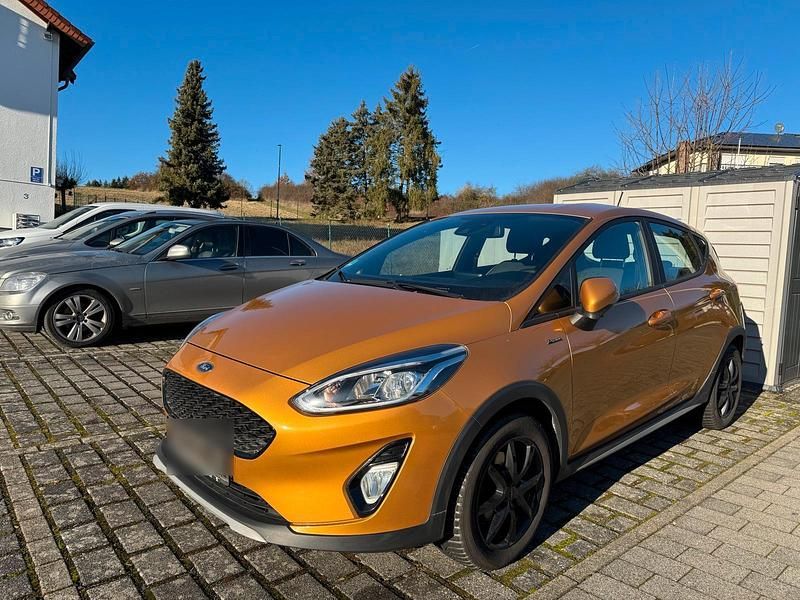 Gelb Gebraucht 2018 Ford Fiesta Active Kleinwagen | 7.590 € (Fairer Preis) - Bild 1/4