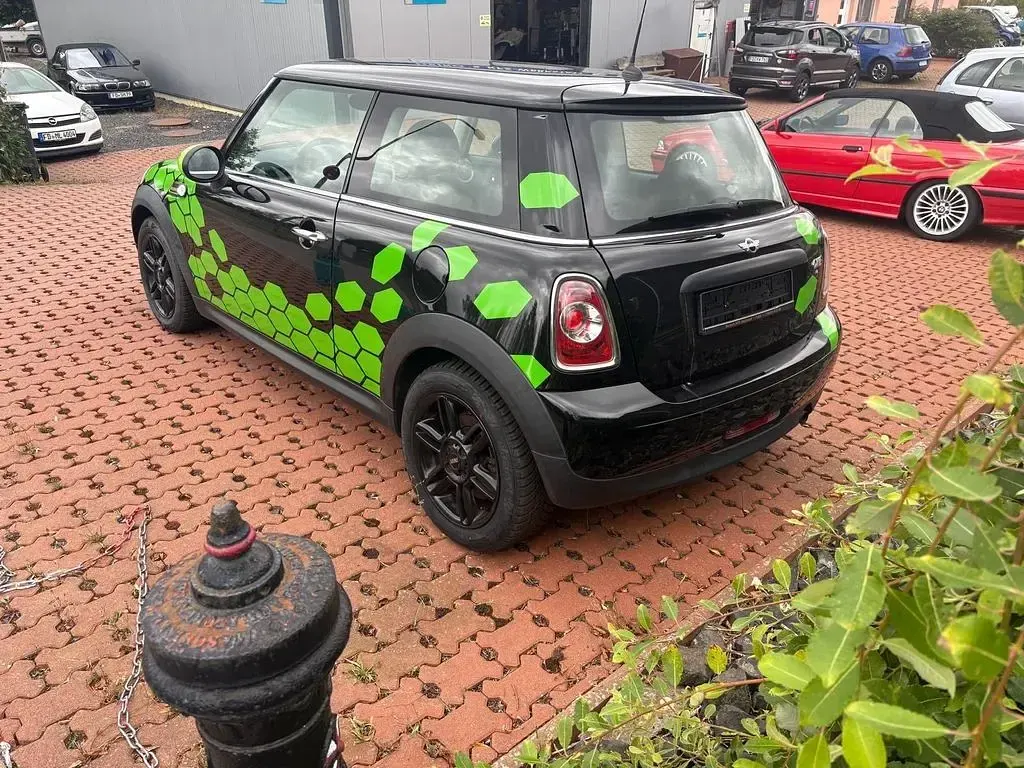 Gebraucht Mini Cooper 75 PS (55 kW) 2013 Schwarz Kleinwagen