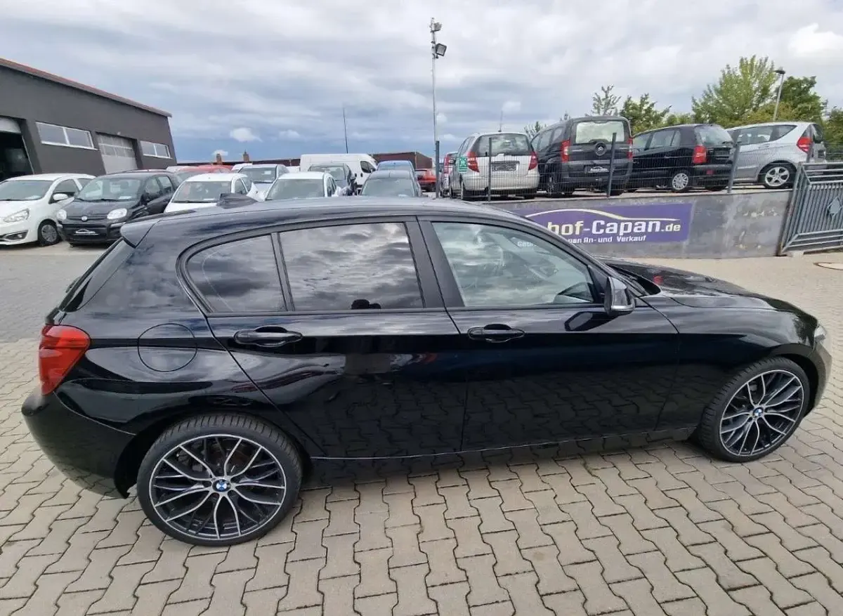 Second-hand BMW 114 102 CP (75 kW) 2013 Negru Hatchback