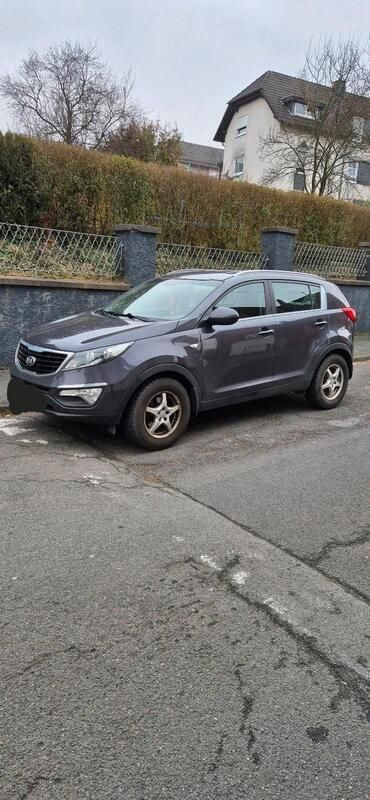 Grau Gebraucht 2015 Kia Sportage Vision SUV | 10.000 € (Fairer Preis) - Bild 1/4