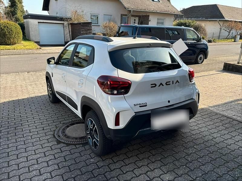 Gebraucht Dacia Spring Extreme 47 kW (65 PS) 2023 Weiß Kleinwagen