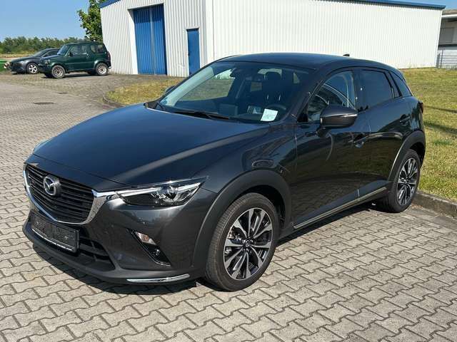 Machine gray Gebraucht 2021 Mazda CX-3 Selection SUV | 19.250 € (Fairer Preis) - Bild 1/4