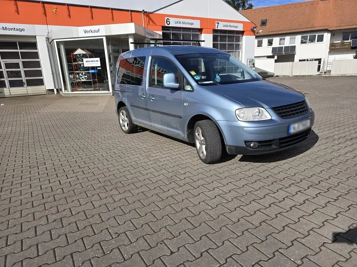 Second-hand VW Caddy Style 105 CP (77 kW) 2011 Argintiu Monovolum