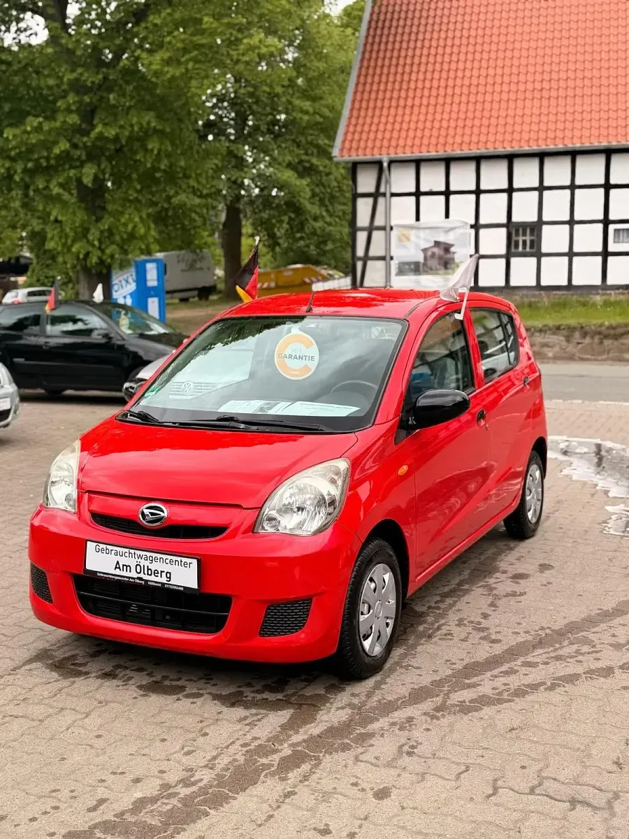 Gebraucht Daihatsu Cuore 69 PS (50 kW) 2010 Rot Kleinwagen
