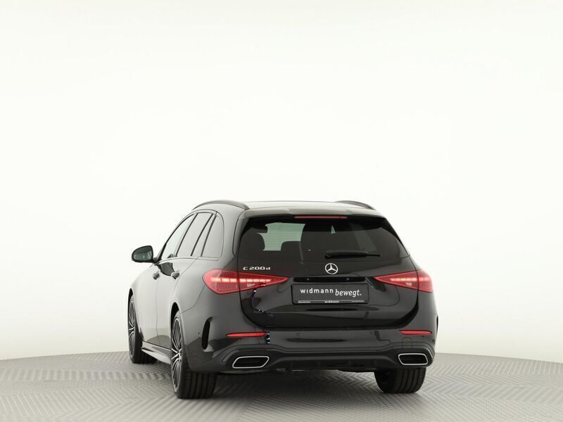 Gebraucht Mercedes C200 AMG 163 PS (119 kW) 2024 Metalliclack obsidianschwarz Kombi